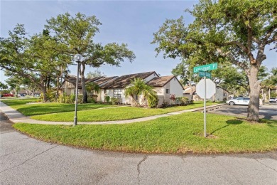 Beautifully Maintained  END UNIT Villa in Fairway Villas - on Sabal Trace Golf and Country Club in Florida - for sale on GolfHomes.com, golf home, golf lot