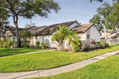 Beautifully Maintained  END UNIT Villa in Fairway Villas - on Sabal Trace Golf and Country Club in Florida - for sale on GolfHomes.com, golf home, golf lot