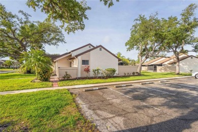 Beautifully Maintained  END UNIT Villa in Fairway Villas - on Sabal Trace Golf and Country Club in Florida - for sale on GolfHomes.com, golf home, golf lot