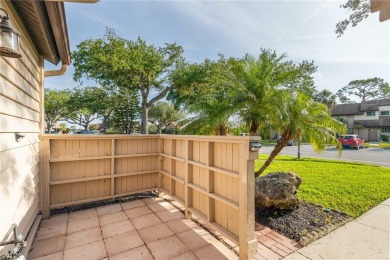 Beautifully Maintained  END UNIT Villa in Fairway Villas - on Sabal Trace Golf and Country Club in Florida - for sale on GolfHomes.com, golf home, golf lot