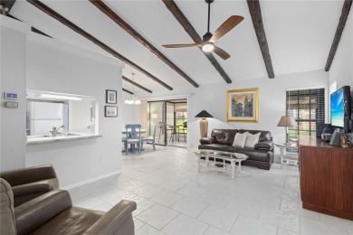 Beautifully Maintained  END UNIT Villa in Fairway Villas - on Sabal Trace Golf and Country Club in Florida - for sale on GolfHomes.com, golf home, golf lot