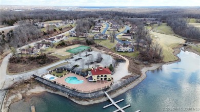 Looking to enjoy all the Lake of the Ozarks has to offer? Then on The Club At Porto Cima in Missouri - for sale on GolfHomes.com, golf home, golf lot