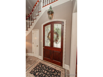 Step into the timeless elegance of this French Provincial on Wynlakes Golf and Country Club in Alabama - for sale on GolfHomes.com, golf home, golf lot