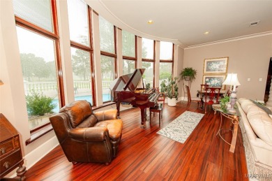 Step into the timeless elegance of this French Provincial on Wynlakes Golf and Country Club in Alabama - for sale on GolfHomes.com, golf home, golf lot