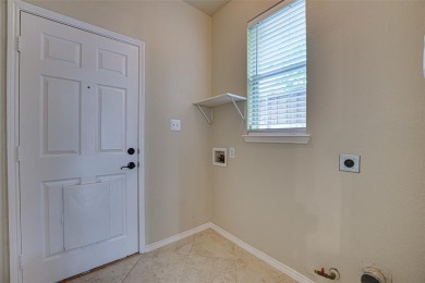 Spacious and beautifully maintained 4-bedroom, 2.5-bath home on The Shores Country Club in Texas - for sale on GolfHomes.com, golf home, golf lot