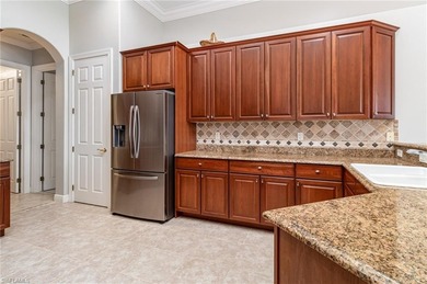 Toll Brothers built a range of single-family homes in Belle Lago on Estero Country Club in Florida - for sale on GolfHomes.com, golf home, golf lot