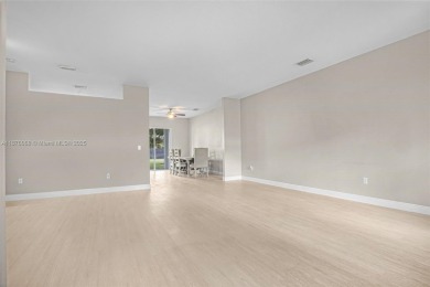 Stunning 4-bedroom, 3-bath home in the serene, gated Augusta on Keys Gate Golf Club in Florida - for sale on GolfHomes.com, golf home, golf lot