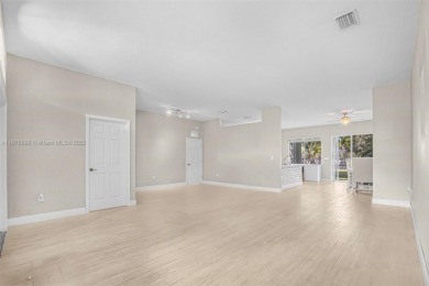 Stunning 4-bedroom, 3-bath home in the serene, gated Augusta on Keys Gate Golf Club in Florida - for sale on GolfHomes.com, golf home, golf lot