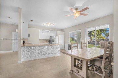 Stunning 4-bedroom, 3-bath home in the serene, gated Augusta on Keys Gate Golf Club in Florida - for sale on GolfHomes.com, golf home, golf lot