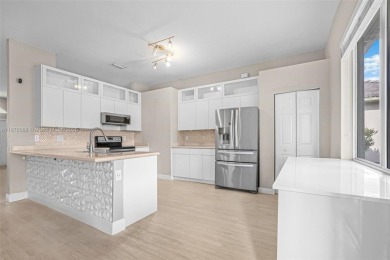 Stunning 4-bedroom, 3-bath home in the serene, gated Augusta on Keys Gate Golf Club in Florida - for sale on GolfHomes.com, golf home, golf lot