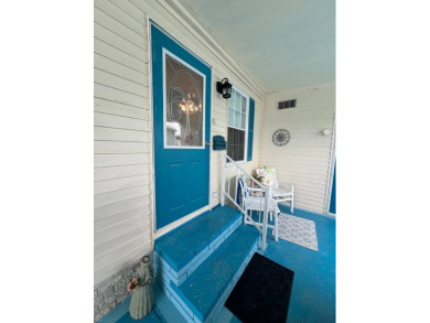 Delightful and meticulously maintained home, partially furnished on Lake Henry Golf Club in Florida - for sale on GolfHomes.com, golf home, golf lot
