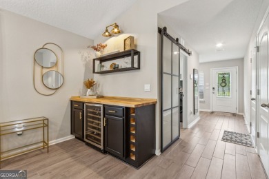 Welcome to 310 Chinquapin Drive, where designer style meets on The Club At Osprey Cove in Georgia - for sale on GolfHomes.com, golf home, golf lot