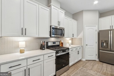 Welcome to 310 Chinquapin Drive, where designer style meets on The Club At Osprey Cove in Georgia - for sale on GolfHomes.com, golf home, golf lot