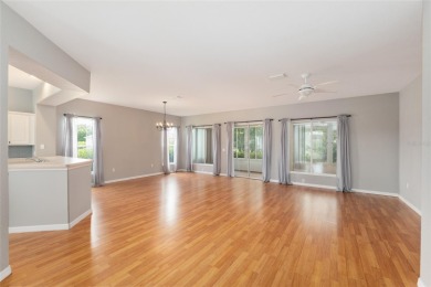 This elegant SANTA ROSA home sits proudly on a corner lot of a on Eagle Ridge At Spruce Creek Country Club in Florida - for sale on GolfHomes.com, golf home, golf lot