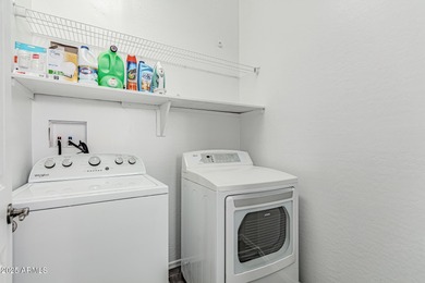 Discover a stunning 3 bed, 2 bath home offering 1,858sqft of on Estrella Mountain Ranch Golf Course in Arizona - for sale on GolfHomes.com, golf home, golf lot