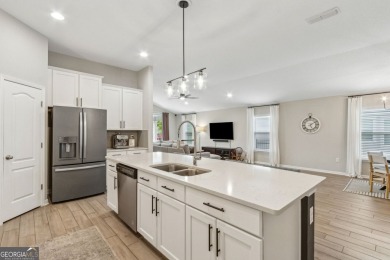 Welcome to 310 Chinquapin Drive, where designer style meets on The Club At Osprey Cove in Georgia - for sale on GolfHomes.com, golf home, golf lot