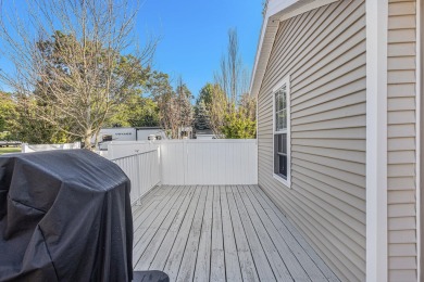 Ready to relax & enjoy yourself. This charming 2004 cottage on Marquette Trails Country Club in Michigan - for sale on GolfHomes.com, golf home, golf lot