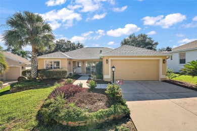 What's the best way to enjoy Florida's beautiful year-round on Oakleigh Executive Golf Course in Florida - for sale on GolfHomes.com, golf home, golf lot