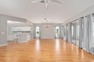 This elegant SANTA ROSA home sits proudly on a corner lot of a on Eagle Ridge At Spruce Creek Country Club in Florida - for sale on GolfHomes.com, golf home, golf lot