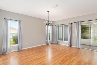 This elegant SANTA ROSA home sits proudly on a corner lot of a on Eagle Ridge At Spruce Creek Country Club in Florida - for sale on GolfHomes.com, golf home, golf lot