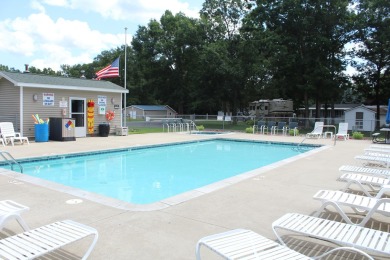 Ready to relax & enjoy yourself. This charming 2004 cottage on Marquette Trails Country Club in Michigan - for sale on GolfHomes.com, golf home, golf lot