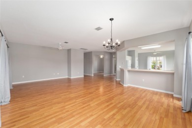 This elegant SANTA ROSA home sits proudly on a corner lot of a on Eagle Ridge At Spruce Creek Country Club in Florida - for sale on GolfHomes.com, golf home, golf lot