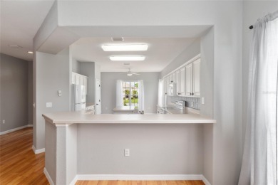 This elegant SANTA ROSA home sits proudly on a corner lot of a on Eagle Ridge At Spruce Creek Country Club in Florida - for sale on GolfHomes.com, golf home, golf lot
