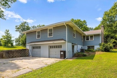 Red Bridge 4-bedroom, 2 1/2 bath raised ranch on spacious corner on Minor Park Golf Course in Missouri - for sale on GolfHomes.com, golf home, golf lot