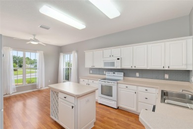 This elegant SANTA ROSA home sits proudly on a corner lot of a on Eagle Ridge At Spruce Creek Country Club in Florida - for sale on GolfHomes.com, golf home, golf lot