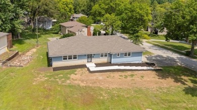 Red Bridge 4-bedroom, 2 1/2 bath raised ranch on spacious corner on Minor Park Golf Course in Missouri - for sale on GolfHomes.com, golf home, golf lot