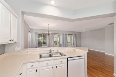 This elegant SANTA ROSA home sits proudly on a corner lot of a on Eagle Ridge At Spruce Creek Country Club in Florida - for sale on GolfHomes.com, golf home, golf lot