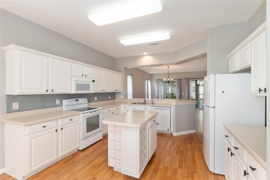 This elegant SANTA ROSA home sits proudly on a corner lot of a on Eagle Ridge At Spruce Creek Country Club in Florida - for sale on GolfHomes.com, golf home, golf lot