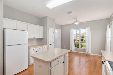 This elegant SANTA ROSA home sits proudly on a corner lot of a on Eagle Ridge At Spruce Creek Country Club in Florida - for sale on GolfHomes.com, golf home, golf lot