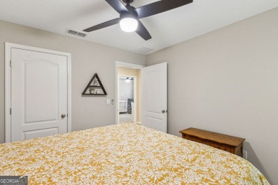 Welcome to 310 Chinquapin Drive, where designer style meets on The Club At Osprey Cove in Georgia - for sale on GolfHomes.com, golf home, golf lot