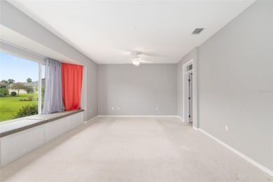 This elegant SANTA ROSA home sits proudly on a corner lot of a on Eagle Ridge At Spruce Creek Country Club in Florida - for sale on GolfHomes.com, golf home, golf lot