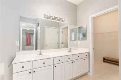 This elegant SANTA ROSA home sits proudly on a corner lot of a on Eagle Ridge At Spruce Creek Country Club in Florida - for sale on GolfHomes.com, golf home, golf lot