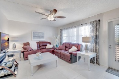 Step into this beautifully furnished 1-bedroom, 1.5-bathroom on Hillsboro Pines Golf in Florida - for sale on GolfHomes.com, golf home, golf lot