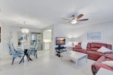 Step into this beautifully furnished 1-bedroom, 1.5-bathroom on Hillsboro Pines Golf in Florida - for sale on GolfHomes.com, golf home, golf lot
