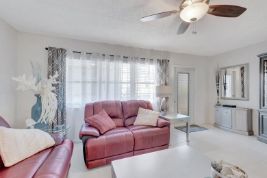 Step into this beautifully furnished 1-bedroom, 1.5-bathroom on Hillsboro Pines Golf in Florida - for sale on GolfHomes.com, golf home, golf lot