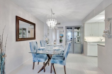 Step into this beautifully furnished 1-bedroom, 1.5-bathroom on Hillsboro Pines Golf in Florida - for sale on GolfHomes.com, golf home, golf lot