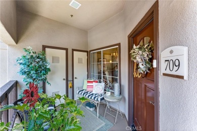 Welcome to this exquisite two-bedroom upstairs, end-unit in the on Tustin Ranch Golf Club in California - for sale on GolfHomes.com, golf home, golf lot