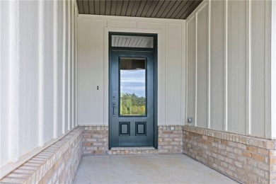 Discover this brand-new home situated adjacent to the golf on Big Sugar Golf Club in Arkansas - for sale on GolfHomes.com, golf home, golf lot