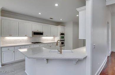 NEW LISTING!! Check out this newly updated home in beautiful on Lake Caroline Golf Club in Mississippi - for sale on GolfHomes.com, golf home, golf lot