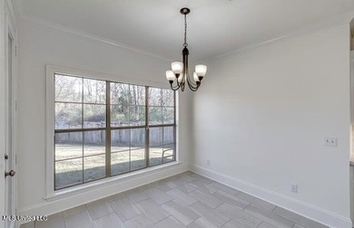 NEW LISTING!! Check out this newly updated home in beautiful on Lake Caroline Golf Club in Mississippi - for sale on GolfHomes.com, golf home, golf lot