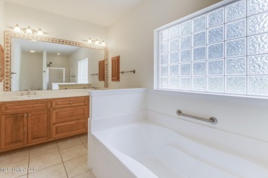 Welcome to Windance, where comfort meets elegance in this on Windance Country Club in Mississippi - for sale on GolfHomes.com, golf home, golf lot