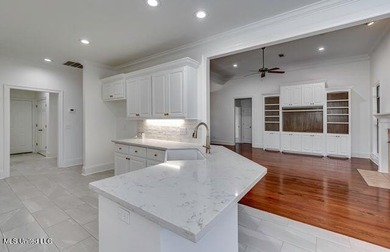 NEW LISTING!! Check out this newly updated home in beautiful on Lake Caroline Golf Club in Mississippi - for sale on GolfHomes.com, golf home, golf lot