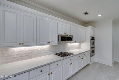 NEW LISTING!! Check out this newly updated home in beautiful on Lake Caroline Golf Club in Mississippi - for sale on GolfHomes.com, golf home, golf lot