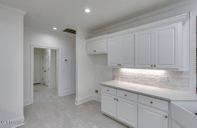 NEW LISTING!! Check out this newly updated home in beautiful on Lake Caroline Golf Club in Mississippi - for sale on GolfHomes.com, golf home, golf lot