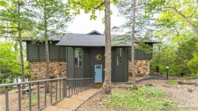 This exceptional lakefront home in Tan-Tar-A Estates at the 26MM on The Oaks Golf Course in Missouri - for sale on GolfHomes.com, golf home, golf lot