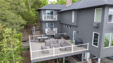 This exceptional lakefront home in Tan-Tar-A Estates at the 26MM on The Oaks Golf Course in Missouri - for sale on GolfHomes.com, golf home, golf lot